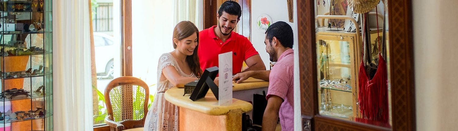 Riviera Nayarit Mexico Requirements & Legal Documents - image of couple at a service desk