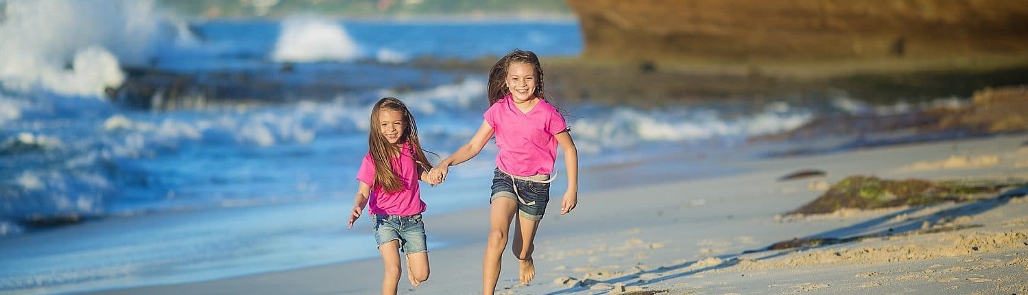 Living in Riviera Nayarit Mexico - image of 2 children running along a beach